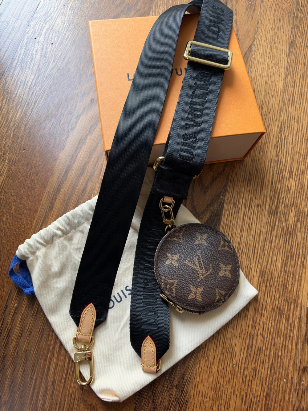 Louis Vuitton Bandoulière black handbag strap with Monogram round Coin Pouch